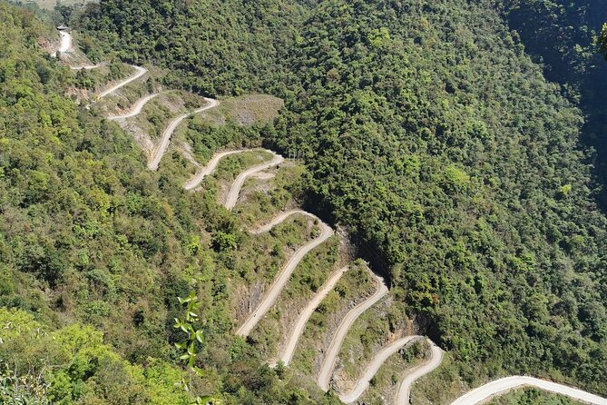 6 Day Tour in Ha Giang Loop Ban Gioc Waterfall Motorbike - Day 2: Lung Khuy Cave, hemp linen, and Vietnam’s northern edge
