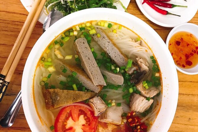 Da Nang Food Tour Motorbike & Sightseeing By Ao Dai Lady Rider - Dragon Bridge adds Da Nang’s big visual moment
