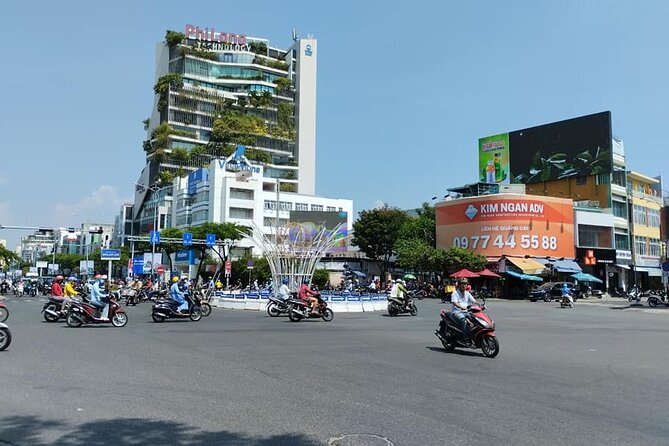 Da Nang Food Tour Motorbike & Sightseeing By Ao Dai Lady Rider - APEC Park gives you a calmer river walk