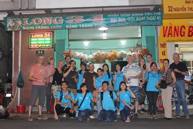 Food Tour by motorbike with local students - Stop One: Rice Paper Salad and Tropical Drinks