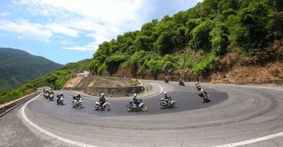 From Hoi An: Explore Hai Van Pass with Motorbike Rider Tour - Quiet countryside roads and an 11th-century temple