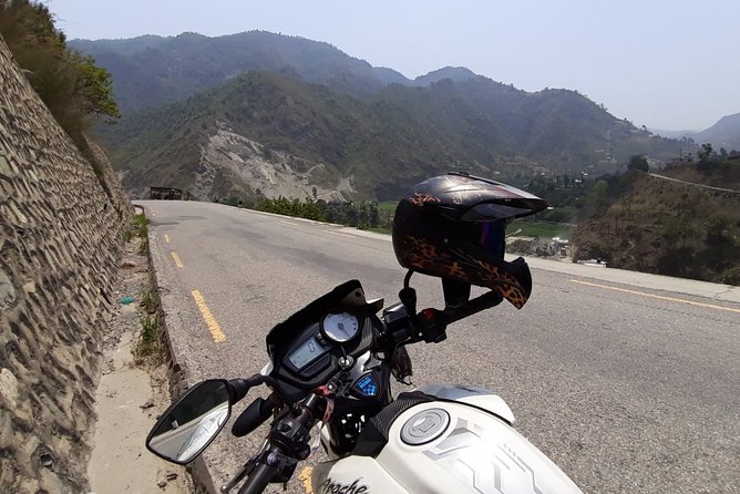 Full-Day Private Sightseeing Tour of Kathmandu by Motorbike - Boudhha: thirty minutes around a major Buddhist center
