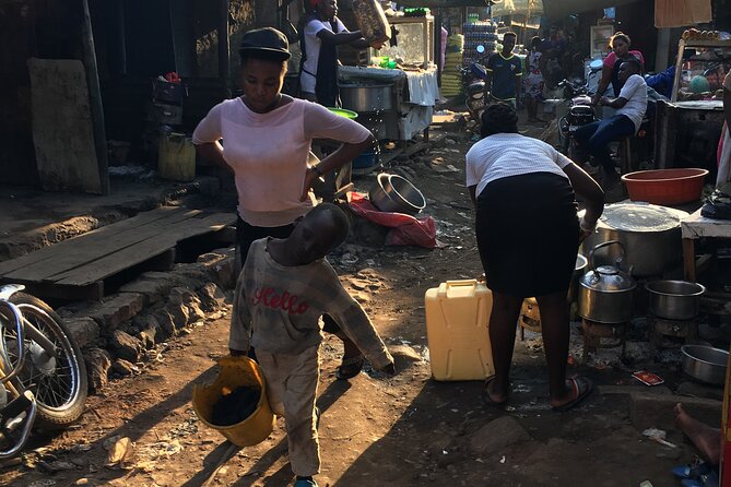 Half day Kampala City Motor Bike Tours - Owino Market, Kampala’s Most Intense Stop