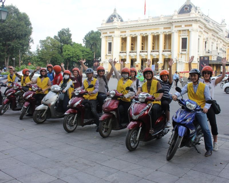 Hanoi: Food and Sightseeing Motorbike Tour with 7 Tastings - A scooter ride through Hanoi’s busy streets