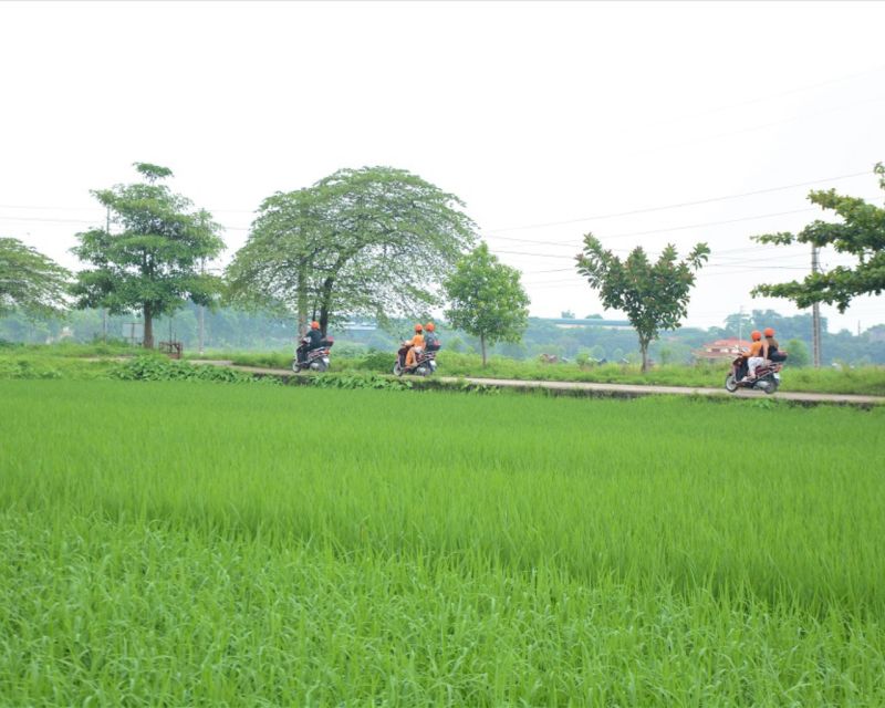 Hanoi Motorbike Countryside Tour - Leaving Hanoi across Long Bien Bridge