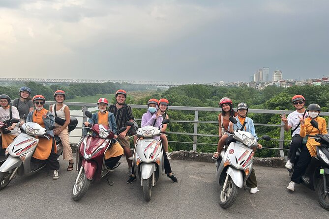 Hanoi Motorbike Tours: Hanoi Motorbike Food Tours Led By Women - Crossing Long Bien Bridge by motorbike