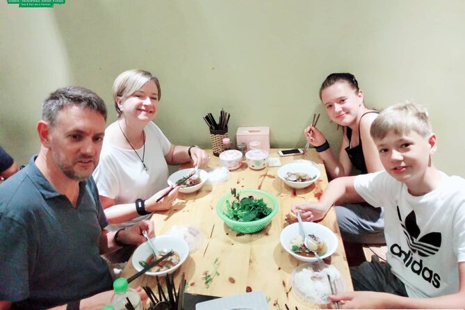 Hanoi Nightlife Food Tour By Motorbikes - Long Bien Bridge and Hanoi after sunset