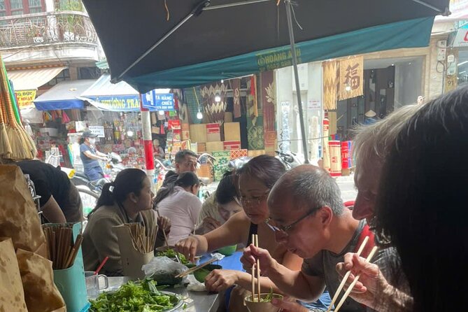 Hanoi Street Food Tour by Motorbike or Walking with Local Guide - Phung Hung Mural Street, Hanoi under the railway arches