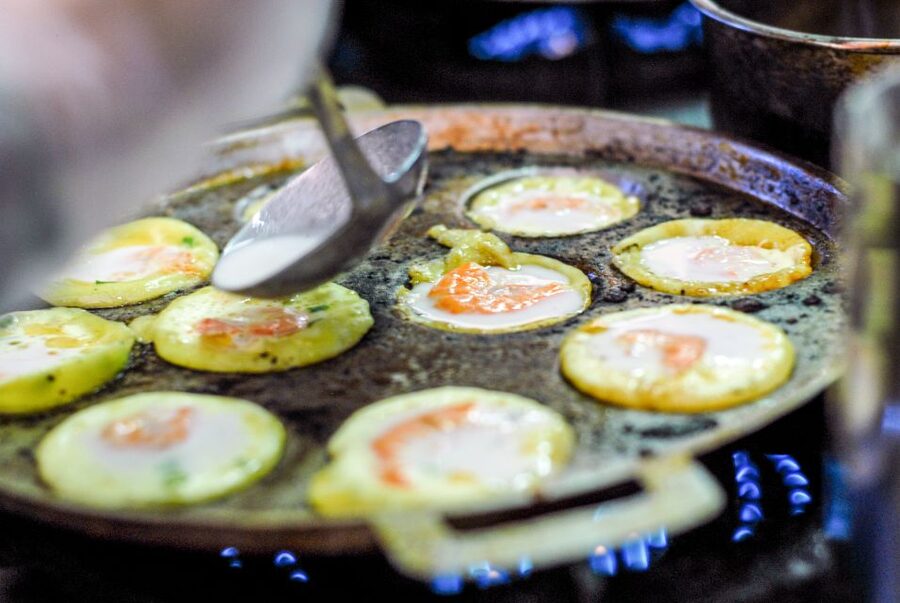 Ho Chi Minh City: Private Street Food Motorbike Tour - Flowers and charcoal cooking at the night market