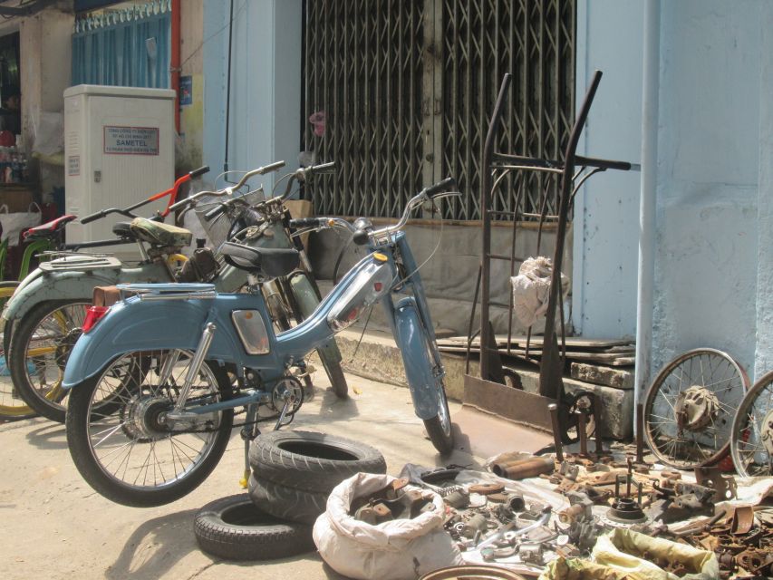 Ho Chi Minh City: Saigon Morning Markets Tour by Motorbike - Motorbike parts, electrical goods, and animal markets
