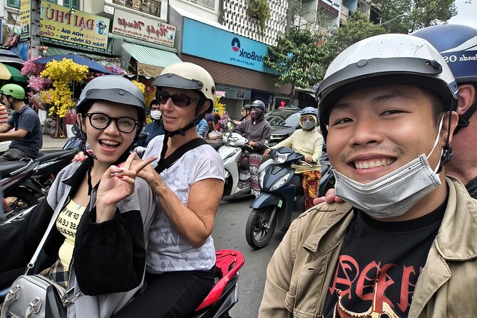 Ho Chi Minh City Sightseeing & Culture Tour By Scooters - Nguyen Hue Street and the Changing City Center