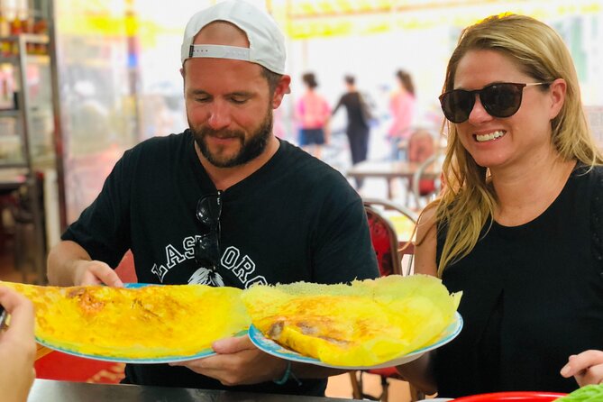 Ho Chi Minh City Street Food Tour & Sightseeing By Motorbike - Bánh mì in a District 10 student area