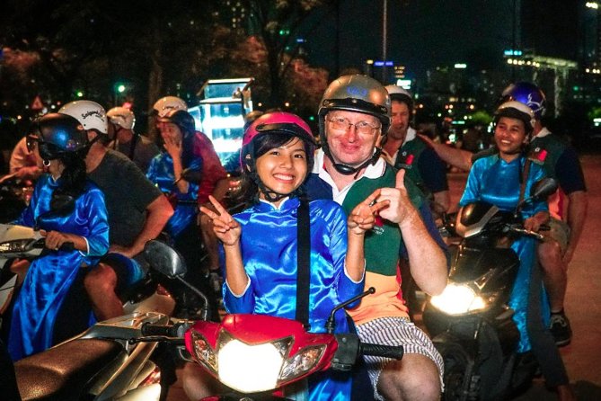 Ho Chi Minh Night Tour by Motorbikes with Female Rider | KissTour - Hồ Thị Kỷ Flower Market and its edible detour