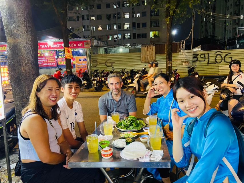 KISSTOUR| Saigon By Night & Street Food Tour on Motorbike - Old apartments and Saigon’s everyday past