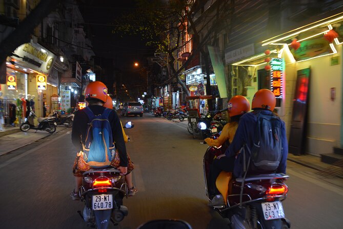Led By Women - Hanoi Foodie Motorbike Tours - Train tracks and an unusual local neighborhood