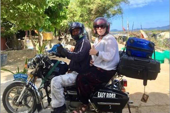 Motorbike Day Tour from Hoi An History, Scenery and Beaches - My Khe Beach and Dragon Bridge: a quick look at Da Nang
