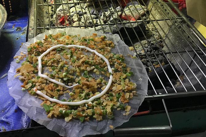 Private Ho Chi Minh Food Adventure by Motorbike with Local Students - Ho Thi Ky Flower Market and the Cambodian Market