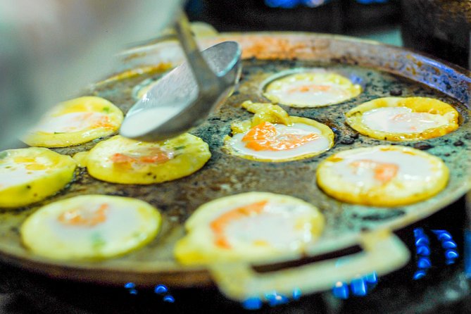 Private Street Food Motorbike Tour in Ho Chi Minh City - District 10: Flowers, night markets, and street-food traditions
