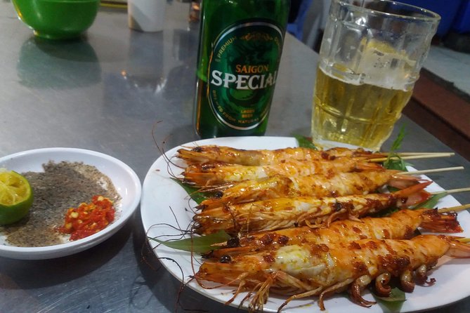 Saigon After Dark and Street Food by Motorbike and Scooter - District 4 and the Big Seafood Finish