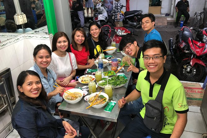 Saigon By Night and Street Food By Motorbike | Opt: Ao Dai Riders - Nguyen Van Cu Bridge and the nighttime river view