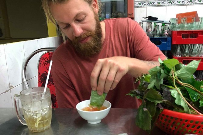 Saigon By Night and Street Food By Motorbike | Opt: Ao Dai Riders - District 4 and the final bowl of noodles