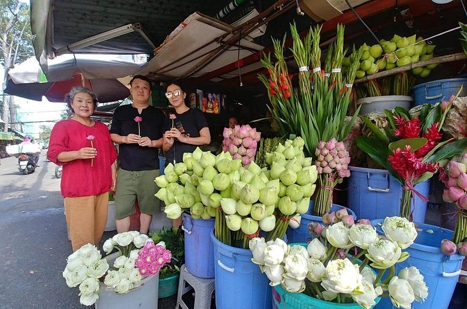 Saigon Market Tour by motorbike ( different markets in HCMC) - War objects and the questions behind old souvenirs