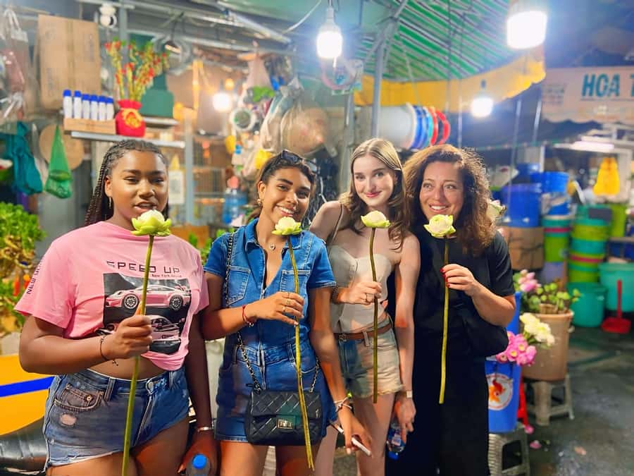 Saigon: Street Food Tasting & Sightseeing Tour by Motorbike - Banh Mi, flan, and Saigon beer