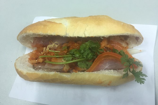 Saigon Unseen and Food Tour by Motorbike - Canals, stilt houses, and a sharper view of city life