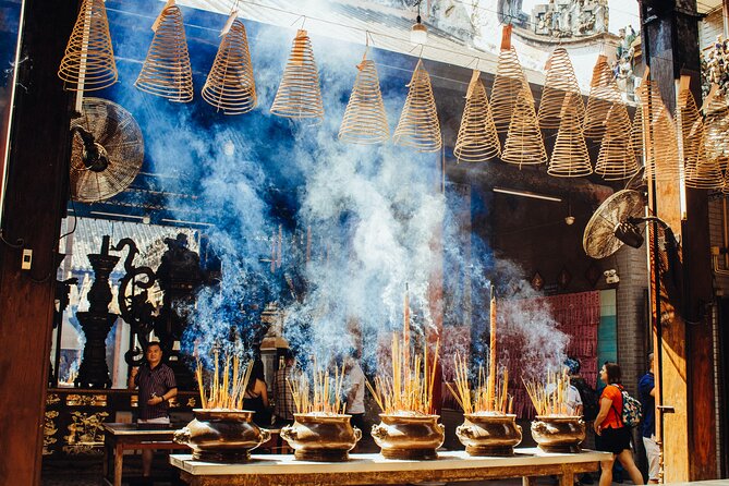 Saigon Unseen, History, & Hidden Gems Sightseeing Motorbike Tour - District 5 introduces Chinatown and an old temple