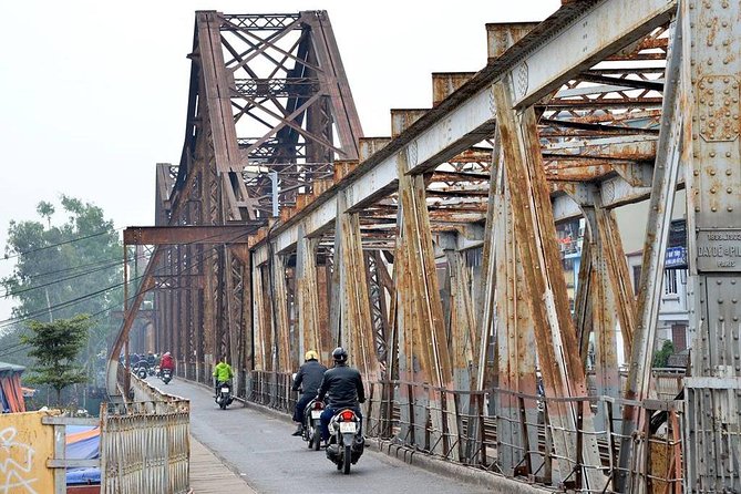 Small-group motorbike sightseeing and food tour in Hanoi - Old City Gate and Dong Xuan Market