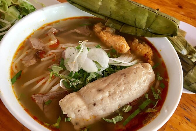 Top Notch Street Food Motorbike Tour In Ho Chi Minh City - Ban Co Market and Southern-style bò kho